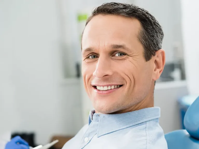 Single Implants 3 Happy patient at Bellingham dentist office enjoying quality dental care.