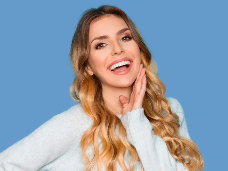 Whitening 2 Smiling woman with radiant teeth after cosmetic dentist in Bellingham treatment.